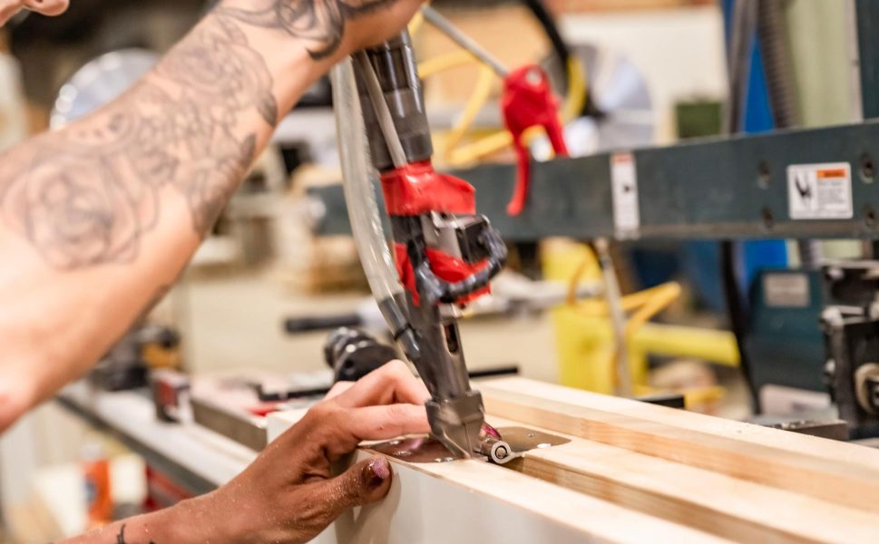 Assembly of a wooden interior door at Portes Saint-Michel factory using precision tools